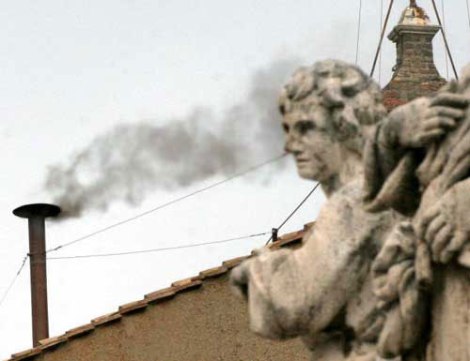 Black smoke emerges from the chimney at the Sistine Chapel in Rome during the 2005 conclave