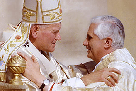 Pope John Paul II embraces Cardinal Ratzinger